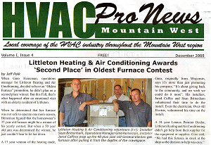 3 installers standing next to furnace that littleton heating donated, this is in hvac news